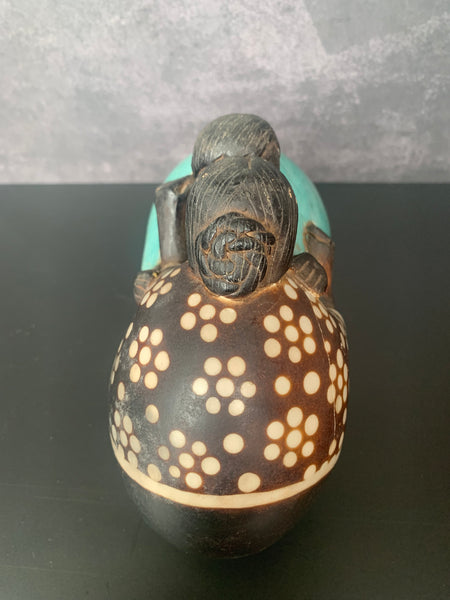 Chulucana kissing couple